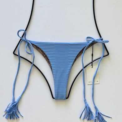 Flat lay front view: Light blue ribbed Acacia Swimwear bikini bottom with tassel tie sides and animal print lining, style Lauie in Seine, size XL.