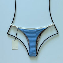 Back view of Acacia Neema Piped Bikini Bottom showing cheeky coverage and ribbed finish.