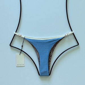 Back view of Acacia Neema Piped Bikini Bottom showing cheeky coverage and ribbed finish.