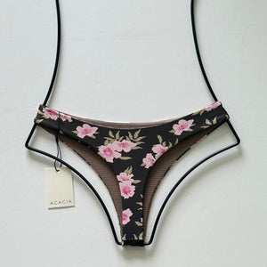 Back flat lay of Acacia Swimwear Brazil Bikini Bottom in Floret print with cheeky cut and floral design.