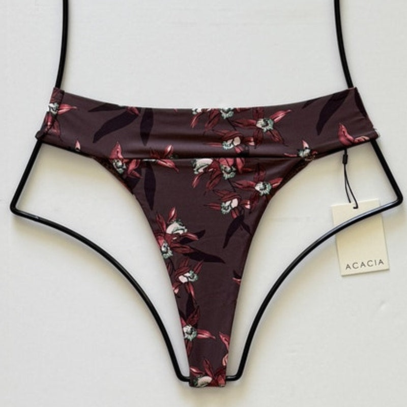 Flat lay of Acacia Swimwear Mateo Bikini Bottom in Ren, brown with burgundy floral print, size small.