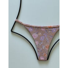 Close up of Acacia Swimwear Neema Bikini Bottom Dahlai floral print – lavender, peach, and blush flowers on dusty rose base