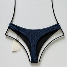 Back view of Acacia Swimwear Brazil bottom in Blue Amur, cheeky cut bikini style.