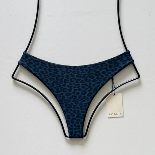 Front view of Acacia Swimwear Brazil bikini bottom in Blue Amur navy animal print, sizes small / medium