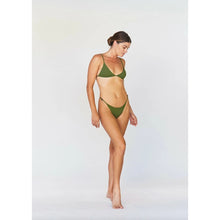 Side angle of Acacia Basil green ribbed bikini bottom on model, size large