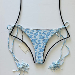 Acacia Swimwear Lauie bikini bottom in Petite Rose floral print, cheeky cut with tassel side ties shown.
