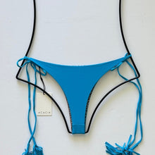 Back flat lay view of Acacia Swimwear Lauie Rocky’s bikini bottom with side-tie strings.