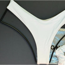 Close-up of OneOne Swimwear Heidi Skimpy Bottom in white fabric and texture with original tags