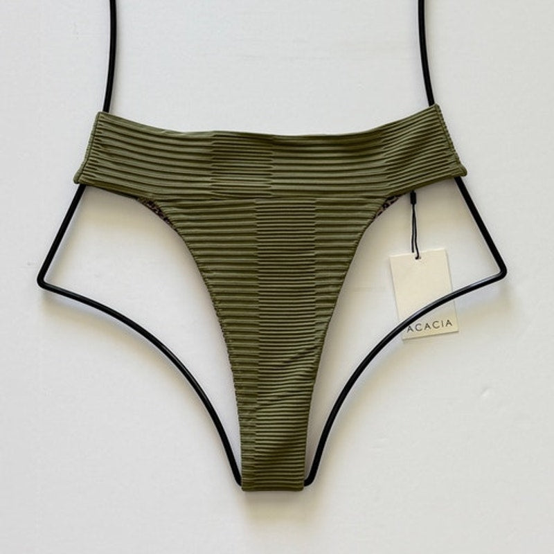 Olive green ribbed Acacia Swimwear Mateo bikini bottom laid flat with dual ribbed fabric texture.