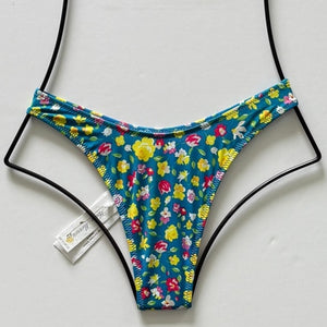 Back view of Heavy Manners High Cut Cheeky Bikini Bottom in Mercer St. floral pattern – cheeky Brazilian cut with high-leg design, bold floral swimwear style.