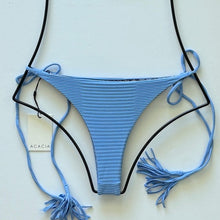 Flat lay alternate view: Powder blue ribbed bikini bottom with long side ties and tassels, Acacia Swimwear style Lauie in Seine.
