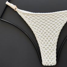 Close-up of crochet detail on Acacia Swimwear Pikake bikini bottom.