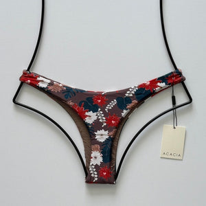 Back flat lay of Acacia Oslo Bikini Bottom in Buket print with minimal cheeky coverage.