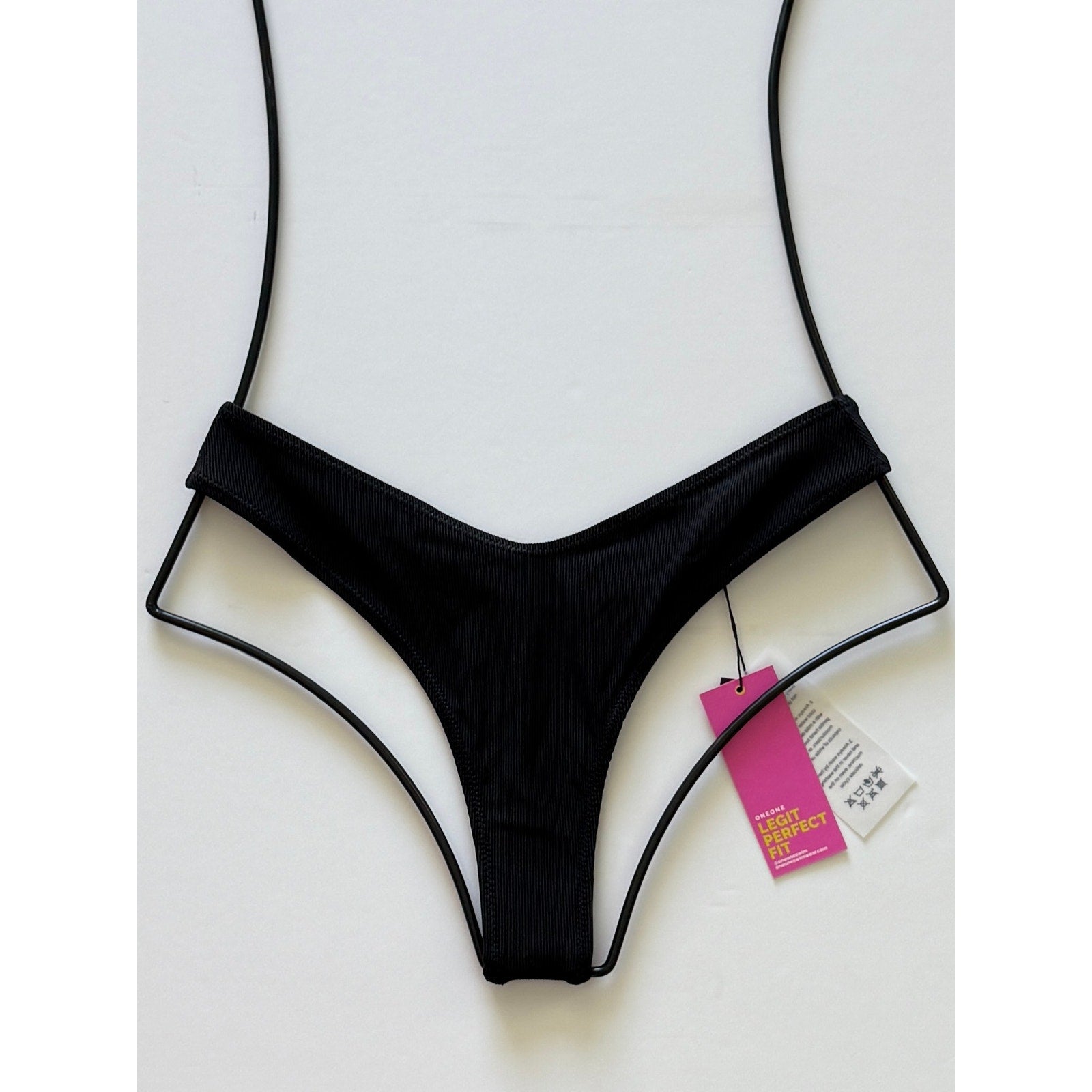 OneOne Swimwear Heidi Skimpy Bikini Bottom – Black Ribbed | Front view