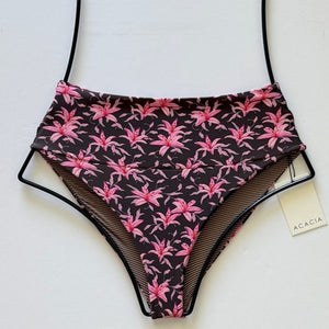 Flat lay of Acacia Swimwear Echo Bikini Bottom in Madonna print – chocolate brown base with pink floral lilies