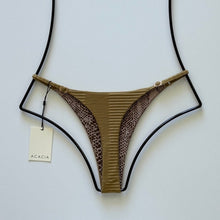 Back view flat lay showing dual print with ribbed front and subtle leopard-print lining.