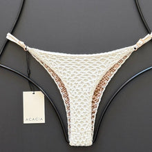Flat lay back view of Acacia Swimwear Neema Crochet Pikake bikini bottom.