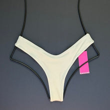 Front view of OneOne Swimwear Heidi Skimpy Bikini Bottom in ivory ribbed, displayed flat with tags attached