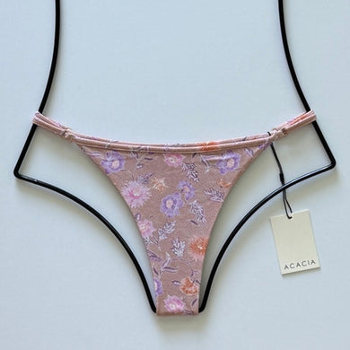Acacia Swimwear Neema Bikini Bottom in Dahlai – dusty rose with lavender and blush floral print, front view, size large.