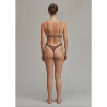 Back view of model in Acacia Oslo Lining Bottom in Neutral Mares showing minimal coverage and seamless design.
