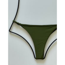 Close-up detail of ribbed fabric and side straps, Basil green Acacia bikini bottom