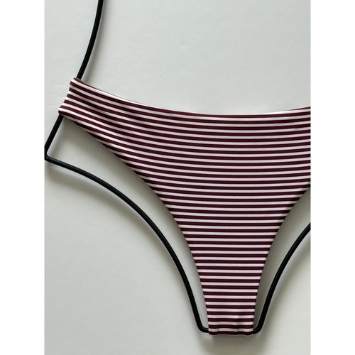 Close-up of Acacia Swimwear Brazil bikini bottom fabric showing striped Carolina design.