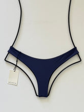 Back view of ACACIA Ho‘okipa Bikini Bottom in Wasabi green, cheeky Brazilian rear coverage, flat lay with designer tag attached.
