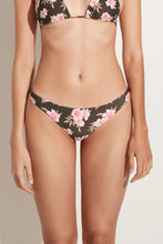 Floral bikini set on a neutral background