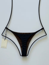 Back view of Acacia Ralphy Bikini Bottom in Licorice showing minimal coverage and sleek silhouette.