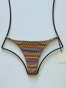 Front flat lay of Acacia Swimwear Ralphy Bikini Bottom in Mada multicolor zigzag print with adjustable side straps.