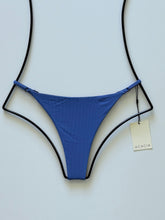 Front flat lay of Acacia Swimwear Ralphy Ribbed Bikini Bottom in Sapphire blue with adjustable side straps.