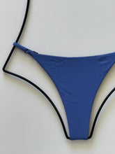 Close-up of ribbed Sapphire blue fabric texture on Acacia Ralphy Bikini Bottom.
