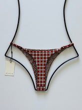 Back view of Acacia Ralphy Bikini Bottom showing reverse animal-inspired print and high-cut silhouette.