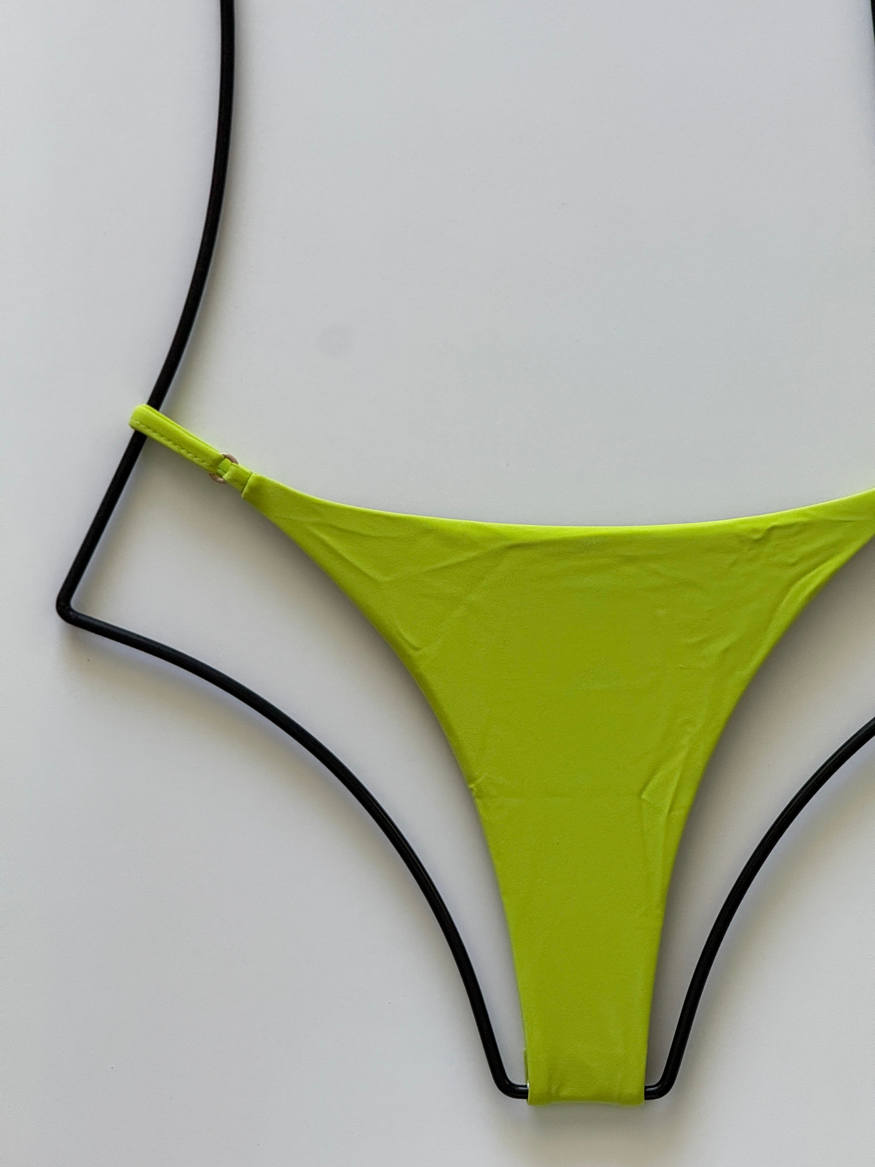 Close-up of Acacia Ralphy Bikini Bottom showing matte finish and smooth recycled fabric texture.