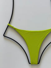 Close-up of Acacia Ralphy Bikini Bottom showing matte finish and smooth recycled fabric texture.