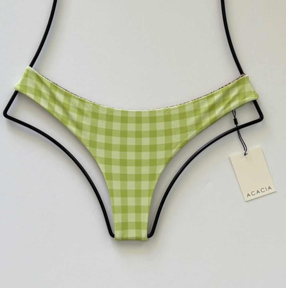 Acacia Swimwear Ho’okipa Bikini Bottom in Stevie green gingham check, minimal coverage cheeky Brazilian cut, size medium – displayed flat with Acacia hang tag.