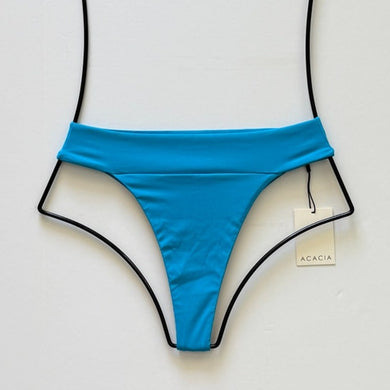Flat lay of Acacia Swimwear Mateo Ribbed Bikini Bottom in Rocky’s Blue, size medium, with seamless waistband.