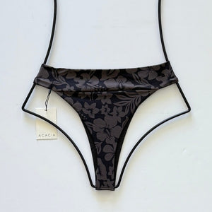 Back view of Acacia Swimwear Mateo bikini bottom showing cheeky high-leg cut and tropical floral design.
