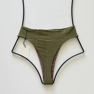 Back flat lay view of olive ribbed Acacia Mateo bikini bottom with cheeky cut.
