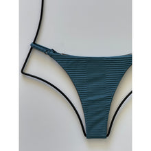Close-up of ribbed texture and side strap hardware in Horizon color bikini bottom.