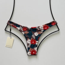 Front flat lay of Acacia Swimwear Oslo Bikini Bottom in Buket featuring brown base with red, teal, ivory, and tan floral print.