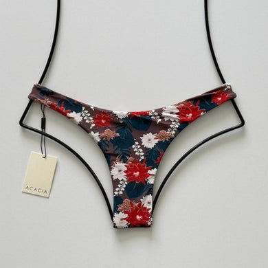 Front flat lay of Acacia Swimwear Oslo Bikini Bottom in Buket featuring brown base with red, teal, ivory, and tan floral print.