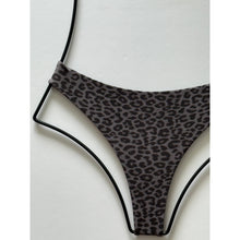 Front view of grey and black animal print Acacia bikini bottom with Brazil cut