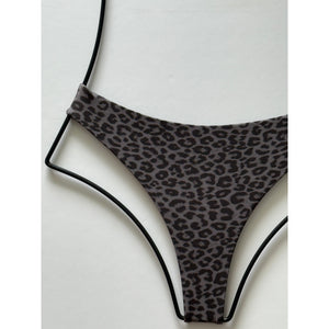 Front view of grey and black animal print Acacia bikini bottom with Brazil cut