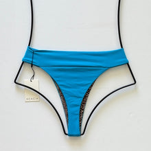 Back view of Acacia Mateo Bikini Bottom showing cheeky fit and ribbed design.