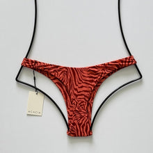 Back flat lay of Acacia Oslo Lining Bikini Bottom in Neon Mares featuring minimal coverage cut.