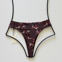 Back  flat lay of Acacia Swimwear Mateo in Ren showing cheeky cut and floral design.