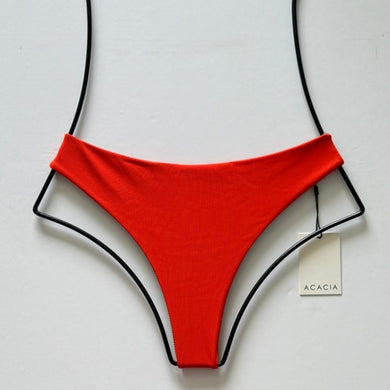 Acacia Swimwear ribbed bikini bottom persimmon – flat lay front with tag