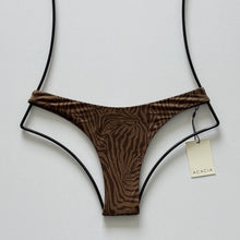 Front flat lay of Acacia Bodywear Oslo Lining Bikini Bottom in Neutral Mares featuring subtle zebra-inspired print.
