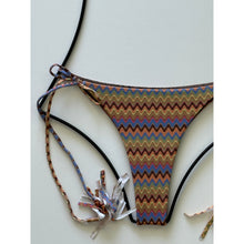 Close-up of Acacia Swimwear Lauie bikini bottom in Mada, highlighting the detailed zigzag print in brown, blue, and coral hues